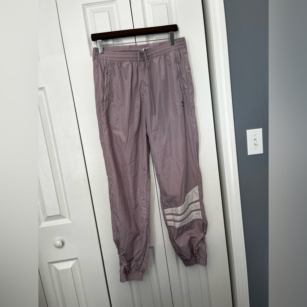 Adidas lavender track pants.